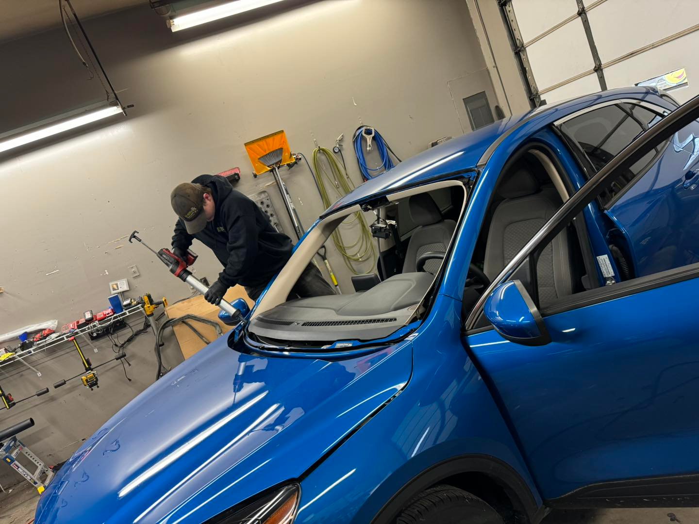 Windshield replacement in progress